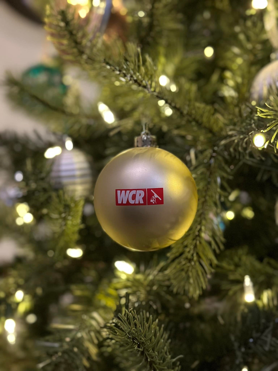 WCR Christmas Ornament on Christmas Tree with Lights