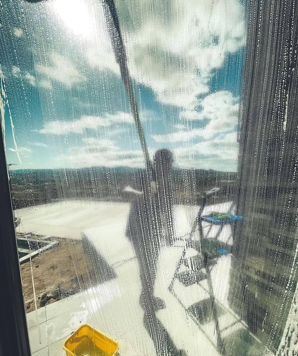 Tinted Glass Being Cleaned