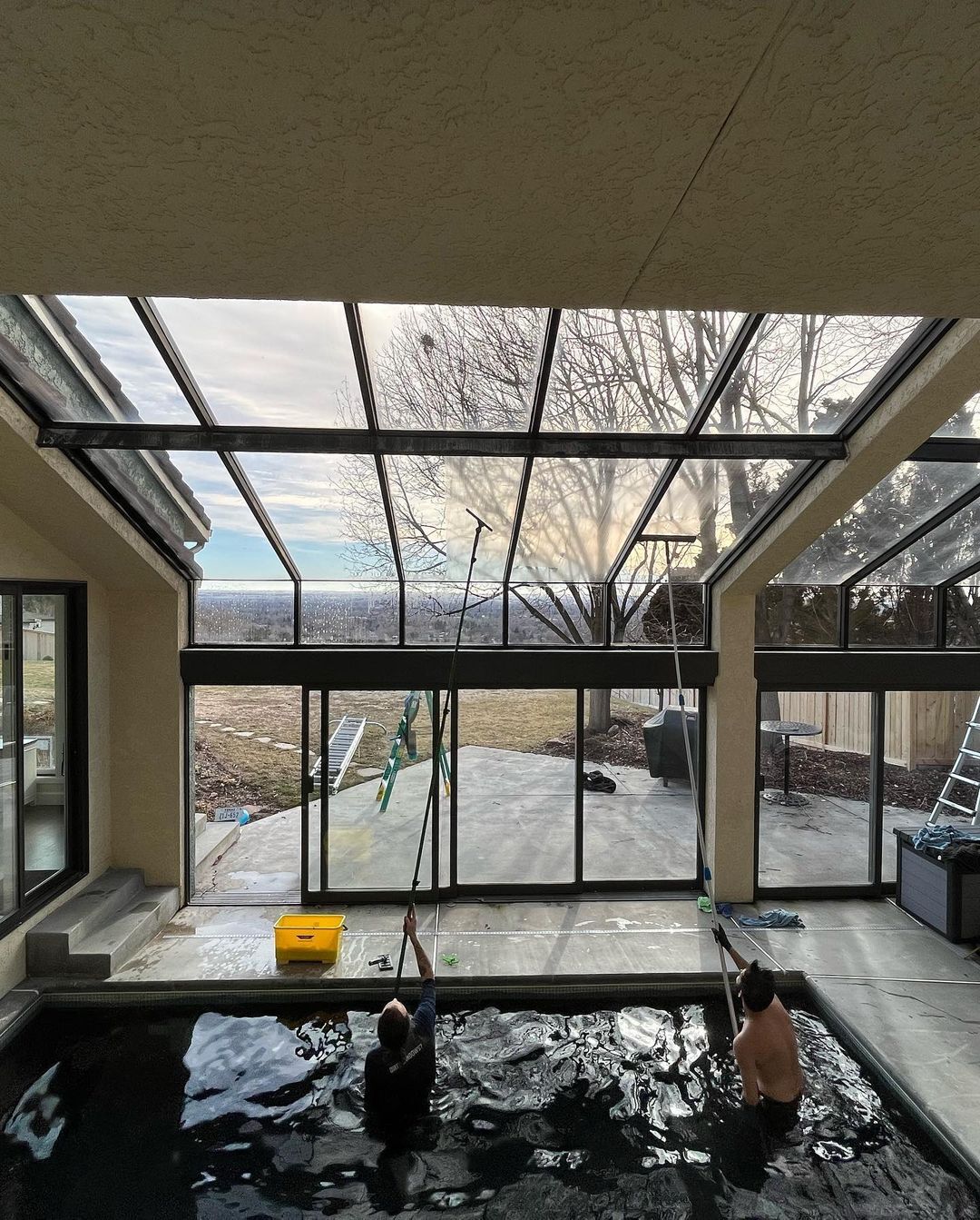 Washing Interior Windows While In a Pool