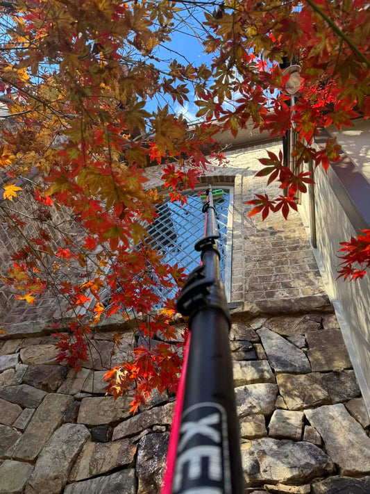 Using Xero water fed pole to clean second story window