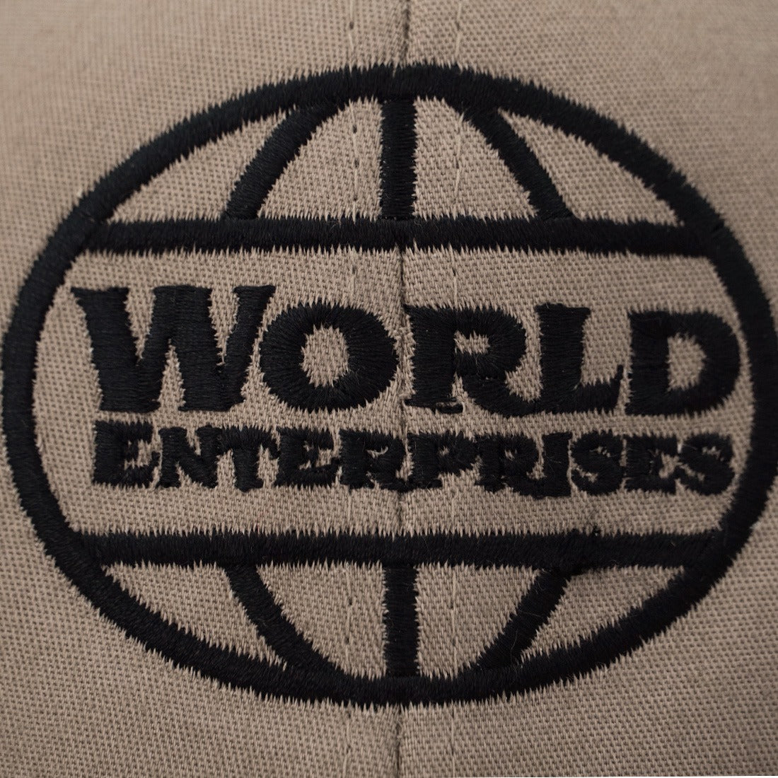 World Enterprises Hat Khaki Logo View