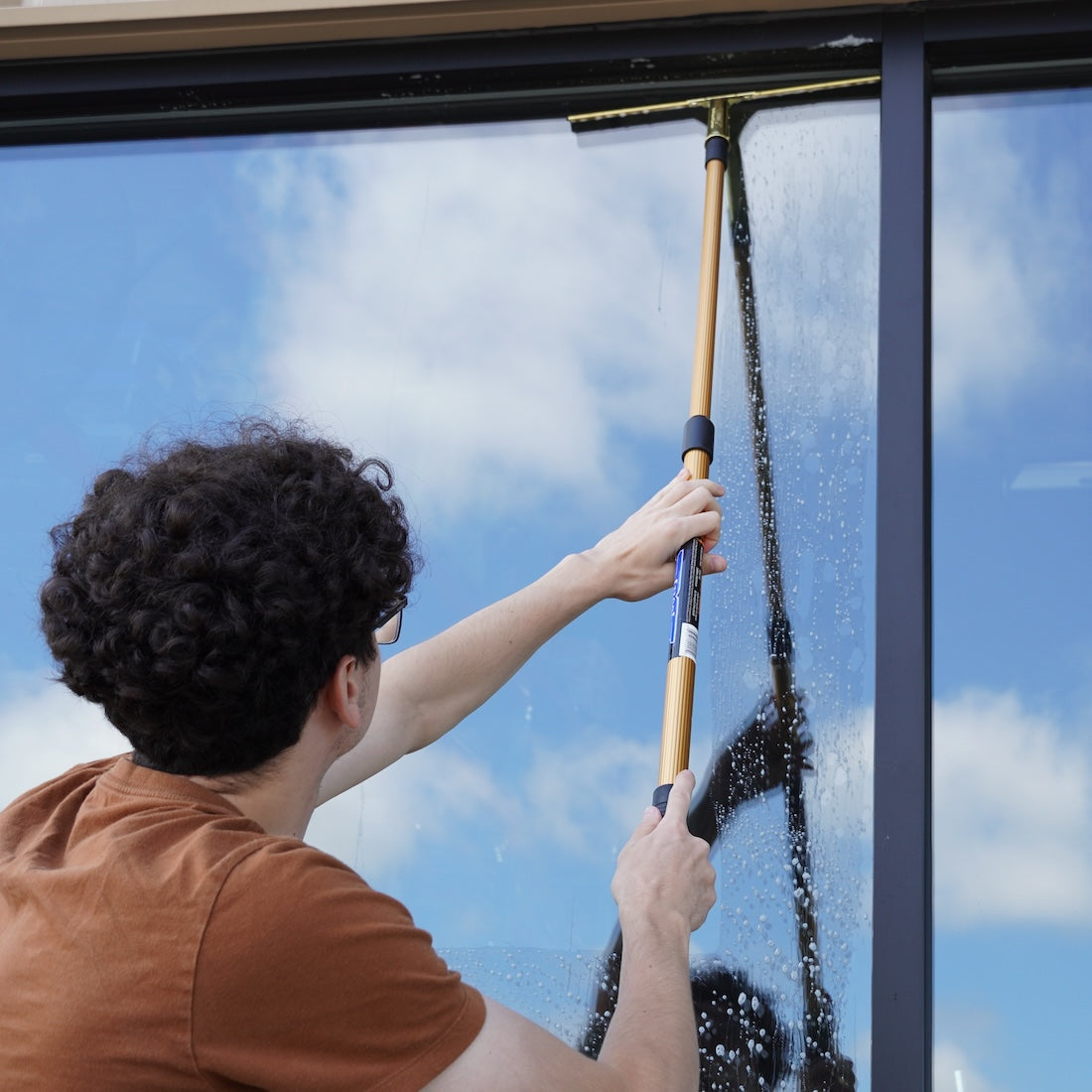 Ettore Pole and Squeegee Cleaning Glass