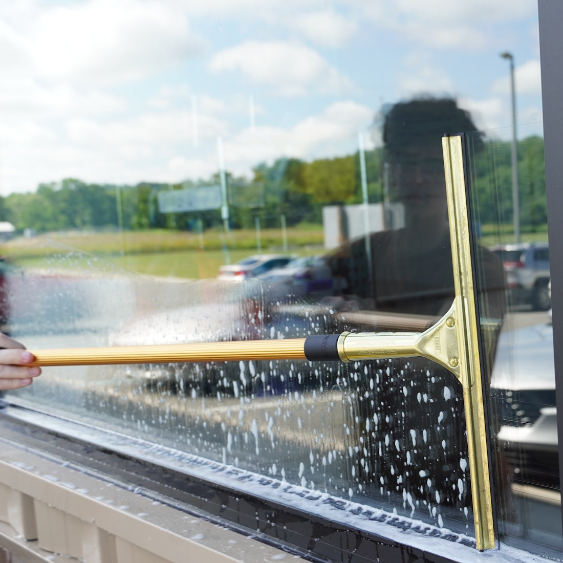 Ettore Pole and Squeegee on Glass