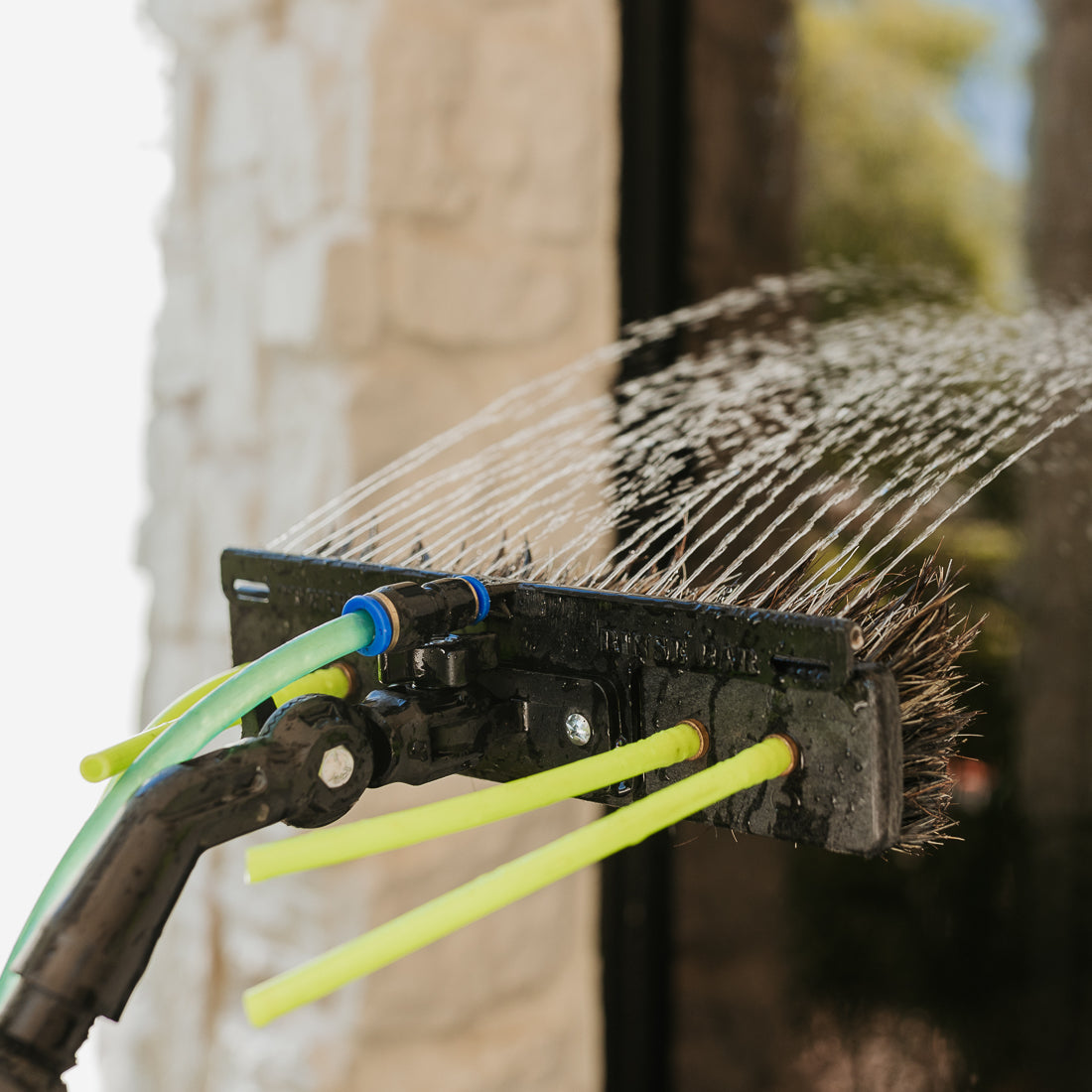 Tucker Over the Top Rinse Bar Attached to XERO Boars Hair Brush on a Water Fed Pole