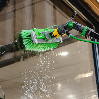 Unger nLITE Powerbrush Complete Spliced Water Fed Brush attached to Unger nLite Water Fed Pole In Use