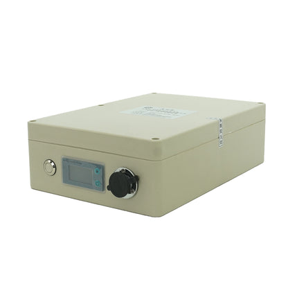 Beige battery control unit with display screen power port and tamper seal.