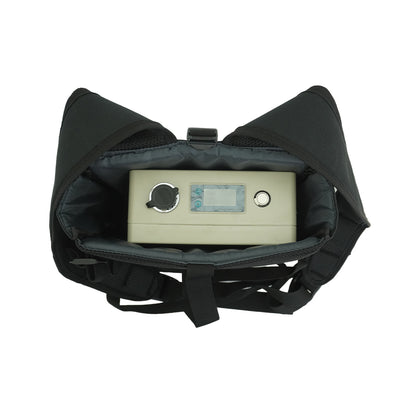 Battery control unit inside black padded backpack for solar panel cleaning system.