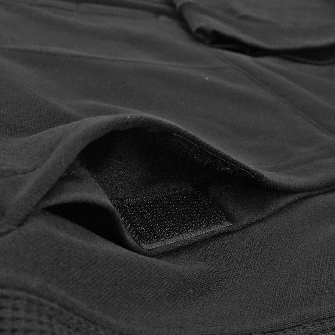 WCR Gym Bro Hoodie Open Pocket Close Up Oblique View